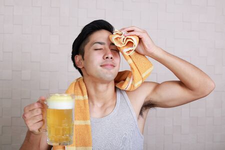 Man drinking beerの写真素材