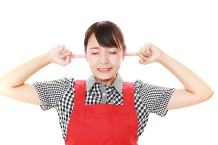Woman closing ears.の写真素材