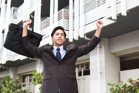 Smiling Asian businessmanの写真素材