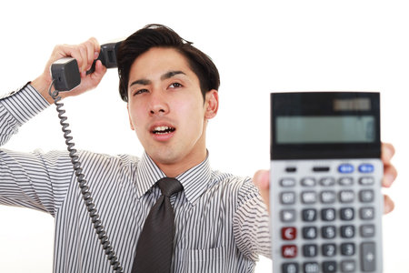 Disappointed Asian businessmanの写真素材