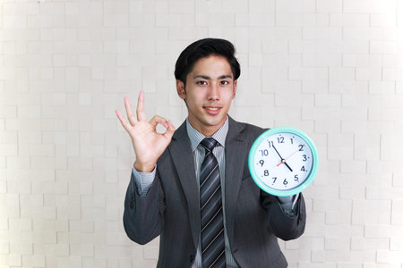 Businessman with ok hand sign