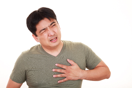 Man having a heart attackの写真素材