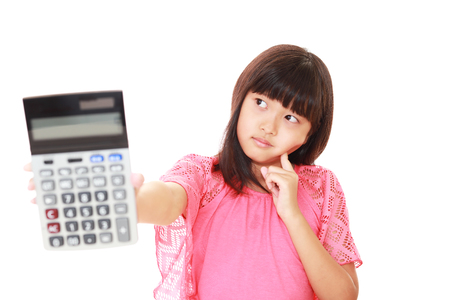 Girl with a calculatorの写真素材
