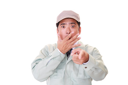 Surprised Asian worker