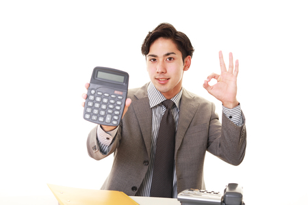 Businessman with ok hand signの写真素材