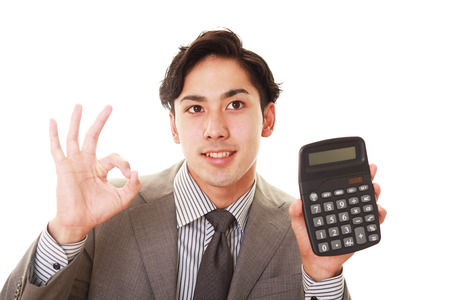 Businessman gives OK signの写真素材