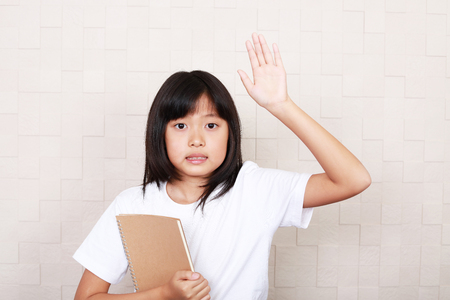 Portrait of an Asian schoolgirlの写真素材