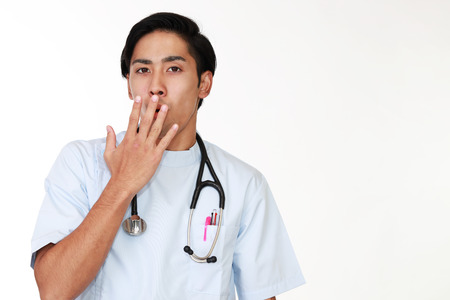 Surprised Asian doctorの写真素材