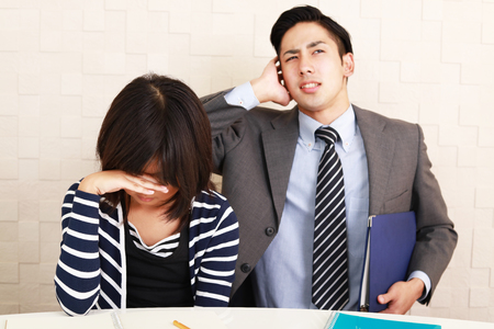 Depressed girl and Frustrated Businessmanの写真素材