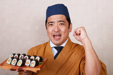 Portrait of a sushi chefの写真素材