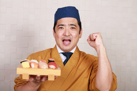 Portrait of a sushi chefの写真素材