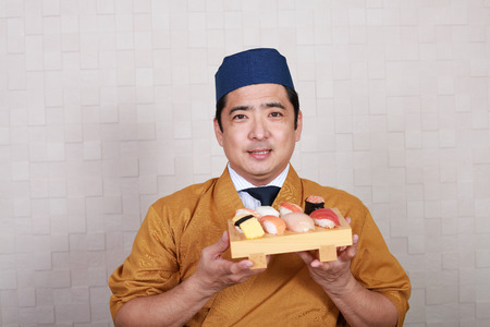 Portrait of a sushi chefの写真素材