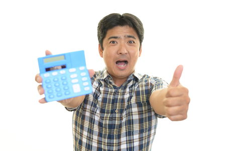 Asian man showing thumbs up signの写真素材