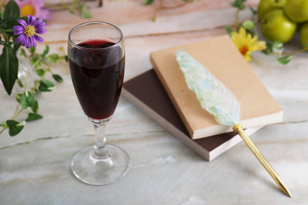 A glass of wine on the tableの写真素材