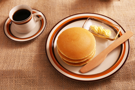 Delicious pancakes and a cup of coffeeの写真素材