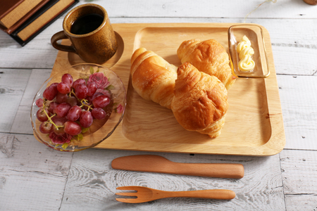 Breakfast of coffee and breadsの写真素材