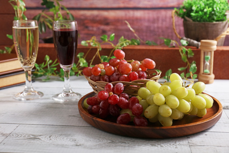 Fresh fruits and two glasses of wineの写真素材
