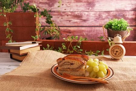 Tasty and healthy breads and fruits on the tableの写真素材