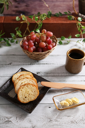 Breakfast of coffee and breadsの写真素材