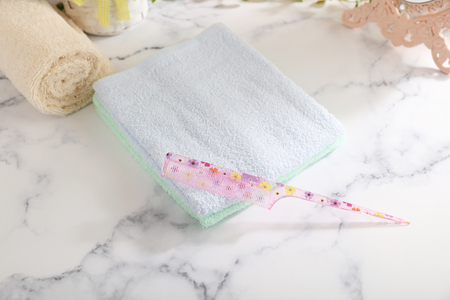 Pile of towels and combの写真素材
