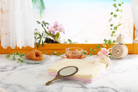 Stylish hand mirror and towelsの写真素材