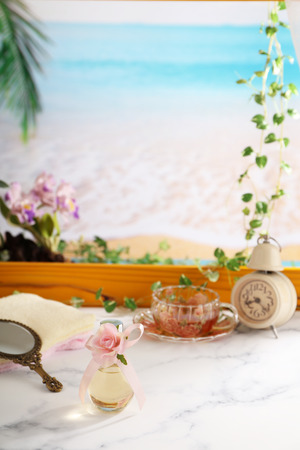 A bottle of perfume on the tableの写真素材