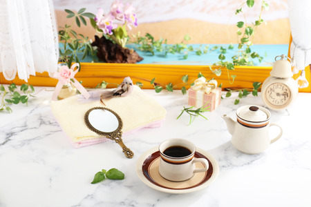 Delicious cup of coffee on the tableの写真素材