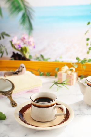 Delicious cup of coffee on the tableの写真素材