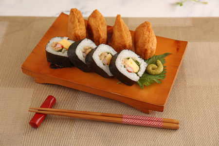 Japanese traditional cuisine sushi pockets with makizushiの写真素材