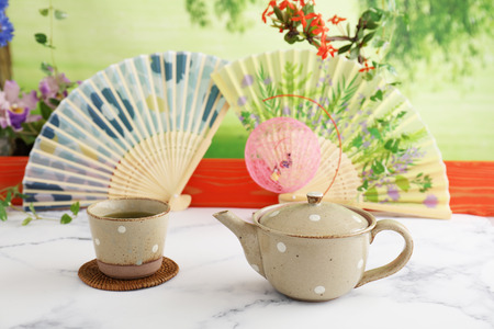 A cup of Japanese green tea with potの写真素材