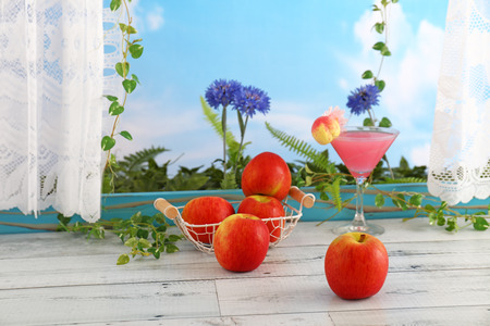 Fresh fruits and a glass of juiceの写真素材