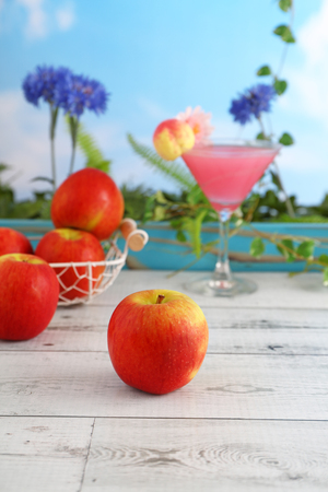 Fresh fruits and a glass of juiceの写真素材