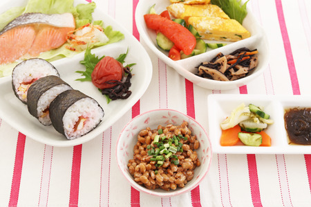 Delicious Japanese cuisines on the dining tableの写真素材