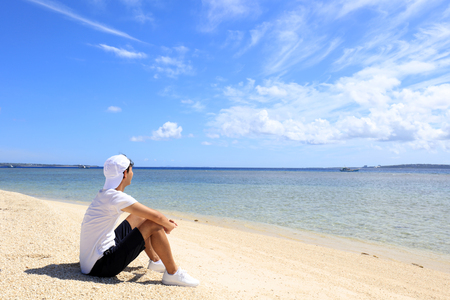 The man who relaxes on the beachの写真素材
