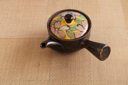 A pot of Japanese green tea on the dining tableの写真素材