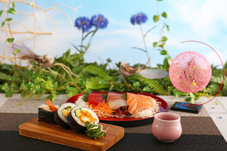 Japanese traditional cuisine Sake and sushi rollsの写真素材