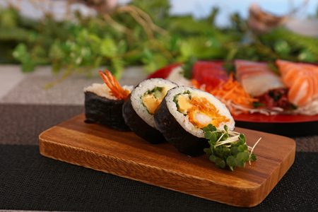 Japanese traditional cuisine sushi rolls and sashimiの写真素材