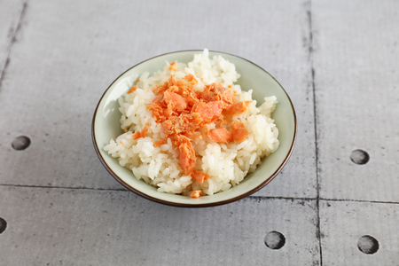 White rice with salmon flakesの写真素材