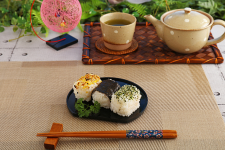 Japanese cuisine rice balls and Japanese green teaの写真素材