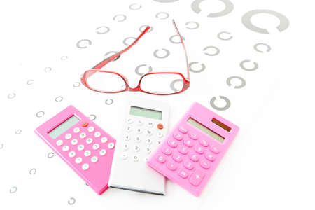 Glasses and calculators on the test card.の写真素材