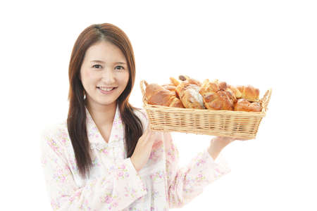 Portrait of woman having breakfast.の写真素材