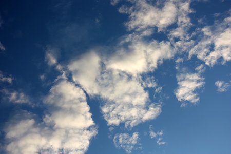 Blue sky and clouds in summer as backgroundの写真素材