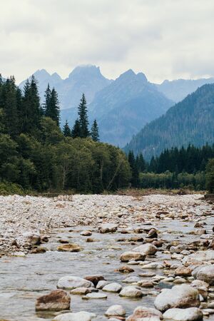 River with stones and mountains, Sea Eye, Poland, Zakopaneの写真素材