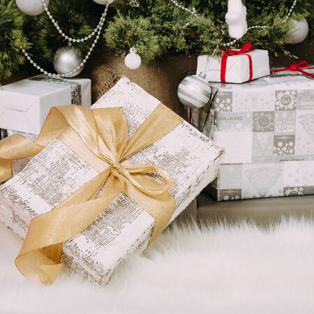 Shabby chic gift with golden ribbonの写真素材