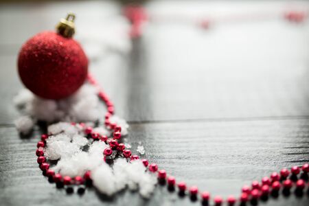 Christmas decoration closeup snowy backgroundの写真素材
