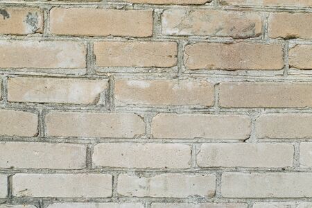 Beige sloppy abstract  texture wall of buildingの写真素材