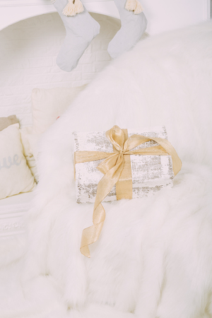 New Year's surprise on white fluffy chairの写真素材