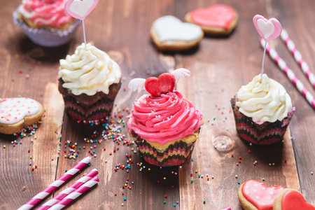 Cakes with whipped cream and love figurine made of marzipanの写真素材