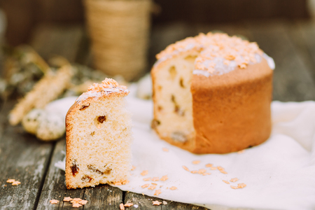 Slice of Easter cake on wooden rustic table, selective focus, copy spaceの写真素材