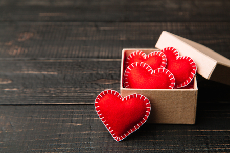 Gift box with red felt hearts for Valentines dayの写真素材